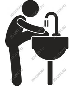  Man washes his hands at the sink